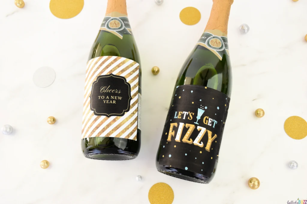 Close up of the New Year's Eve printable wine bottle labels on bottles.