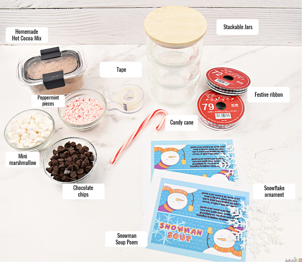 flat lay of supplies to make Snowman Soup Hot Cocoa Jar DIY gift idea