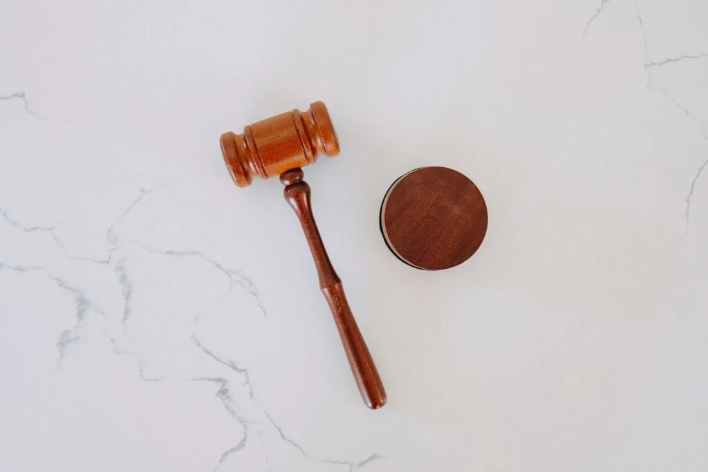 a judge's gavel on a white background