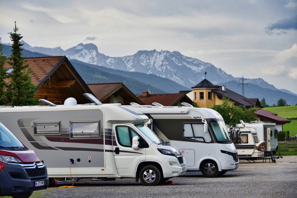 When looking for the right tiny home for you, there are lots of things to consider. Do you want it to be mobile, like these campers in the mountain parking lot?