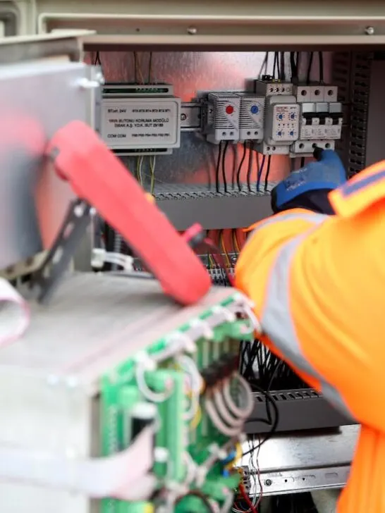 an electrician working on wiring