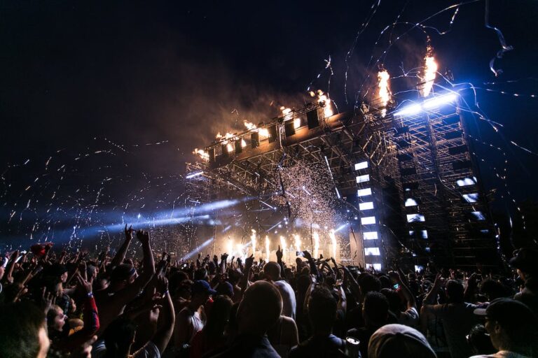 Use these tips for finding the best concert tickets to attend live shows like these people at a live concert.