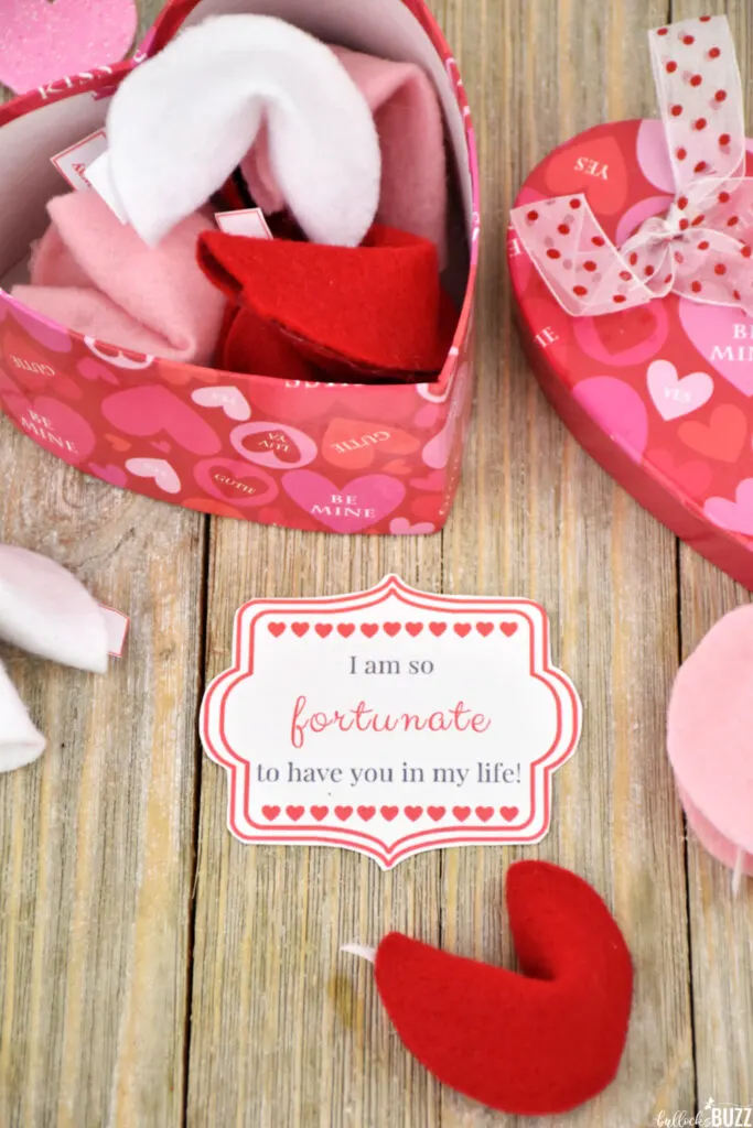 Picture of the printable gift tag for DIY Felt Fortune Cookies for Valentine's Day with a red fortune cookie next to it