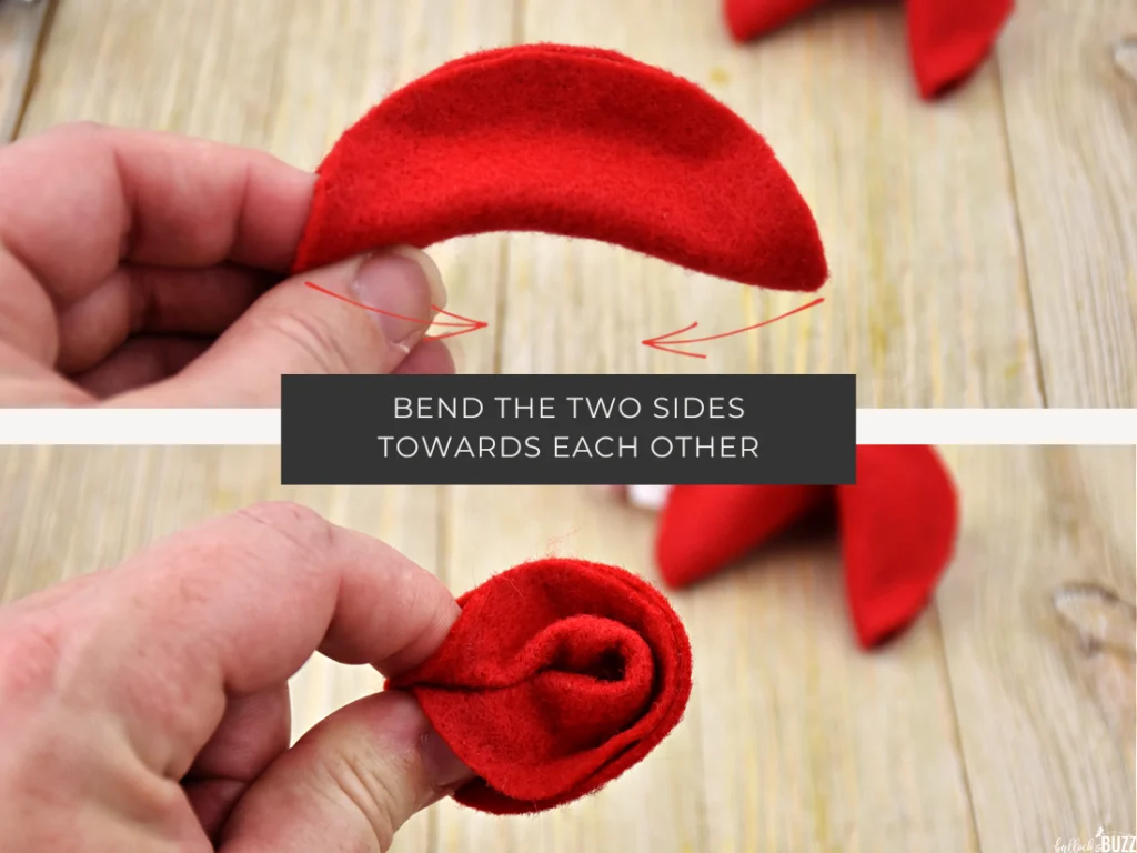 Bend the two edges of the half circle  backwards towards each other to form fortune cookie shape