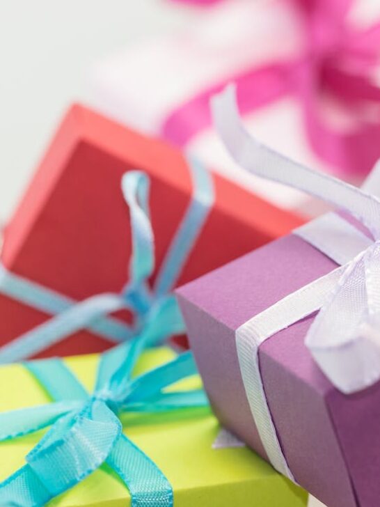 a pile of gifts for the modern professional wrapped in cheerful colors
