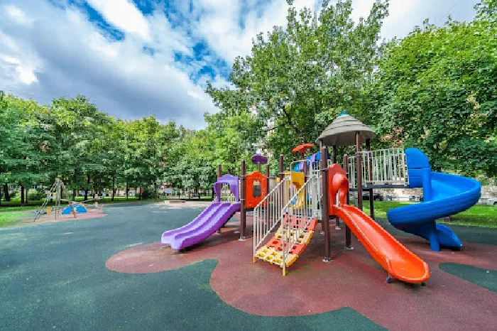 A colorful playset added when learning how to build a secure playground for children.