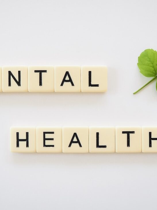 Scrabble blocks spelling out mental health. Here are tips on managing mental health.