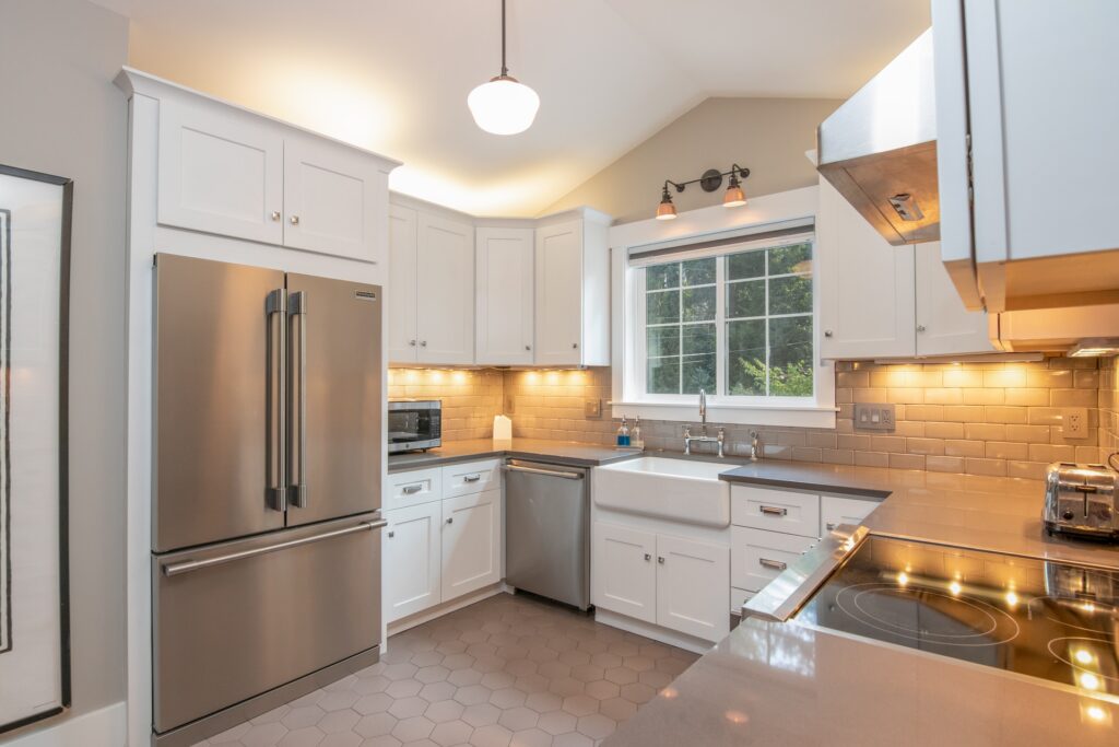 Buying new appliances made this white kitchen a beautiful room.