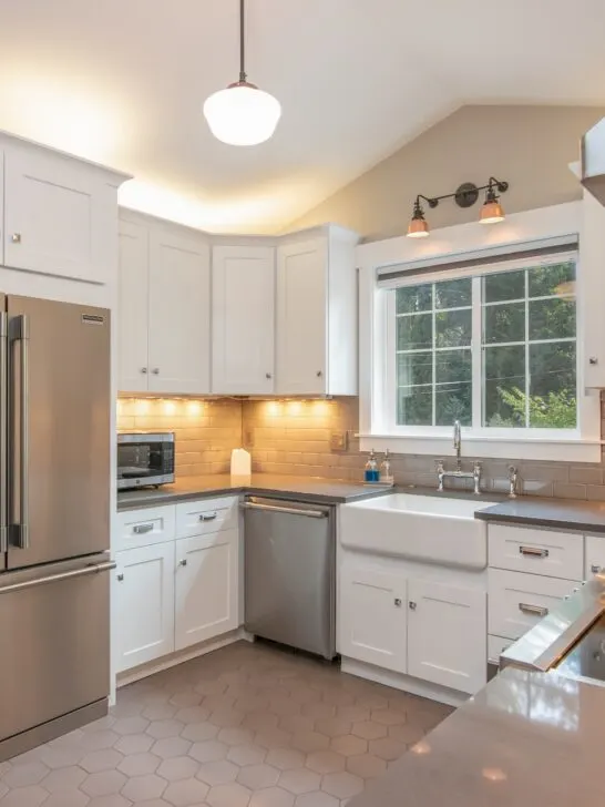 Buying new appliances made this white kitchen a beautiful room.