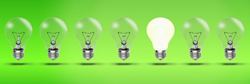 A graphic of lightbulbs on a green background