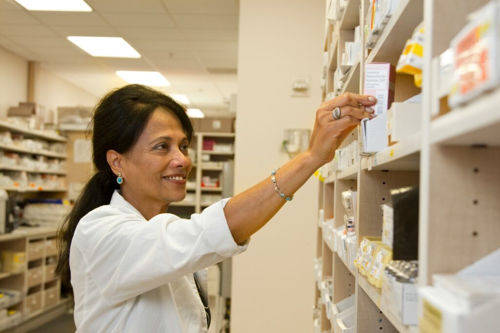 A woman working as a pharmacy technician