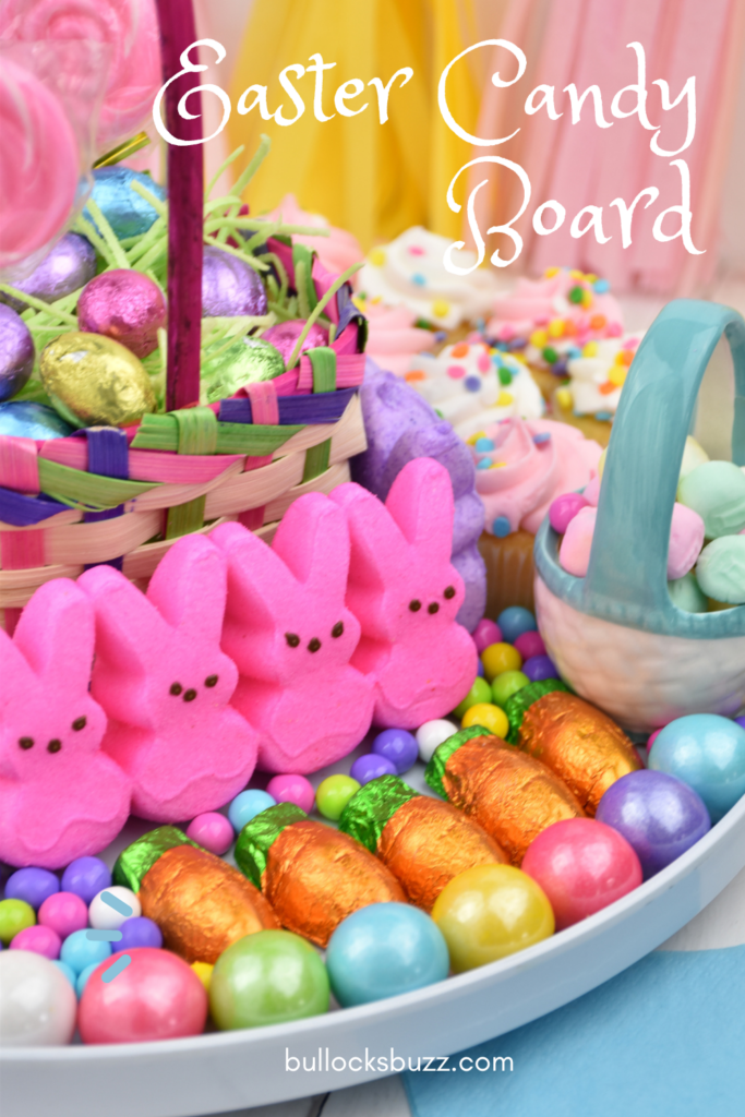 A close up image of part of the colorful Easter Dessert Charcuterie Board filled with chocolates, bunnies, gumballs and more.