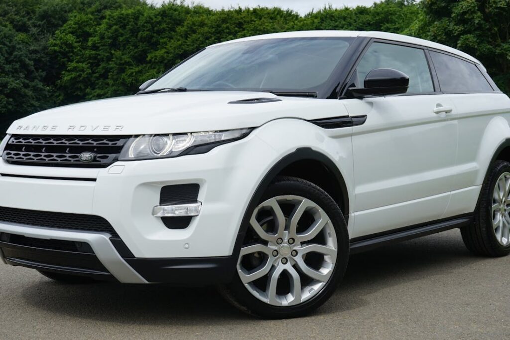A brand new white Range Rover people can look at when shopping for a new car.