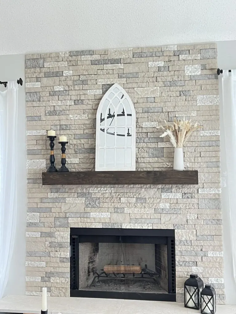Side angle of our finished DIY Fireplace Remodel