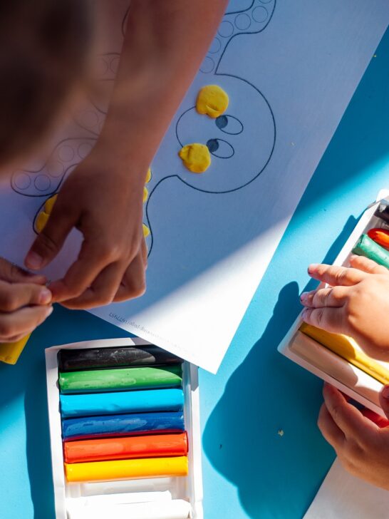 Children working on crafts and ways crafts can teach kids financial responsibility