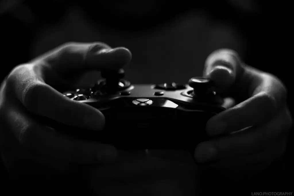 A gaming controller in someone's hands