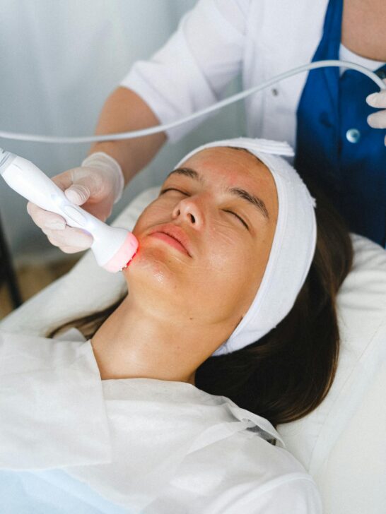 A woman undergoing laser resurfacing, one of the 6 most popular cosmetic procedures to help you look younger