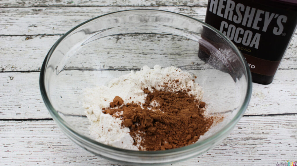 Mixing the flour and cocoa powder together in a small bowl