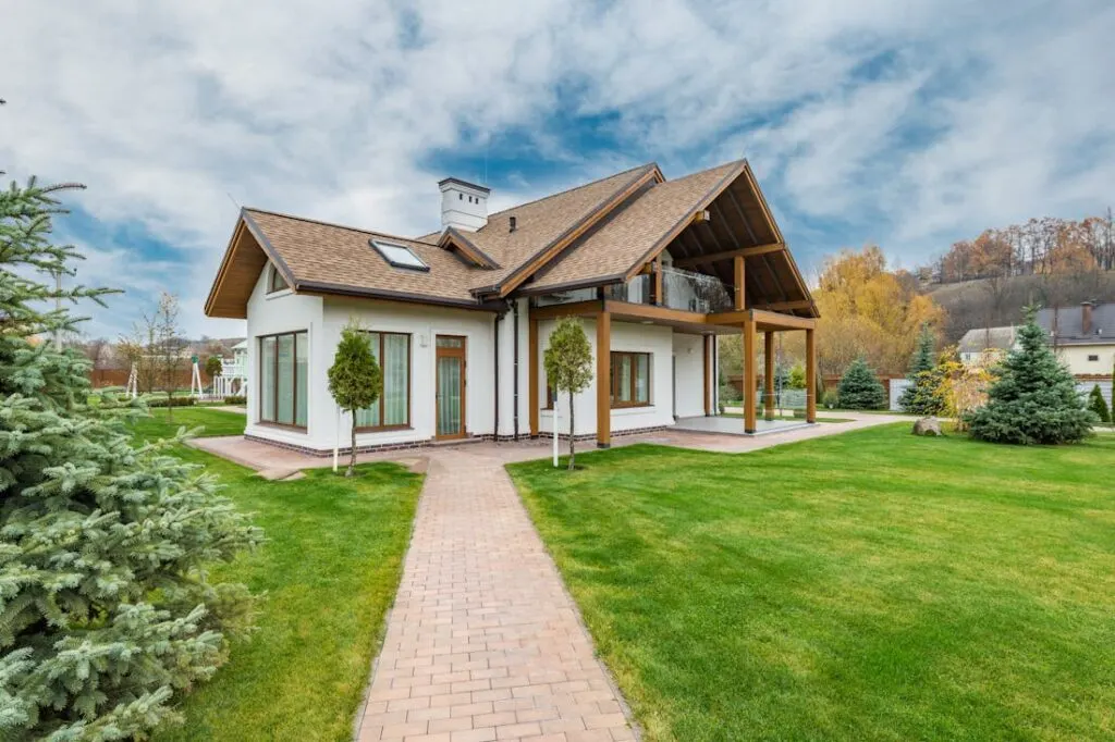 A pretty, modern brown and white cottage.