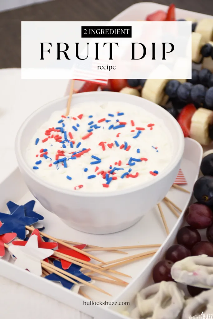 Close up picture of a small bowl of fruit dip surrounded by fruit