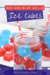 Close up of a glass filled with red and blue Jell-o ice cubes and lemon lime soda with a red and white polka dot paper straw