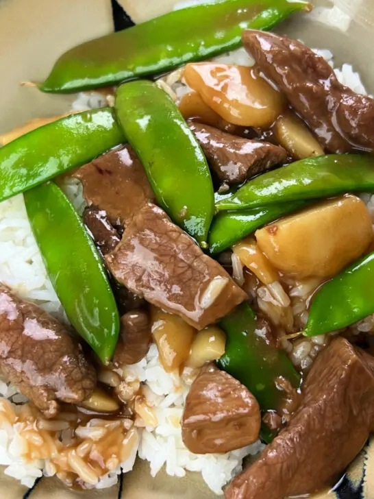 Beef with Snow Peas and Water Chestnuts Stir Fry in a bowl