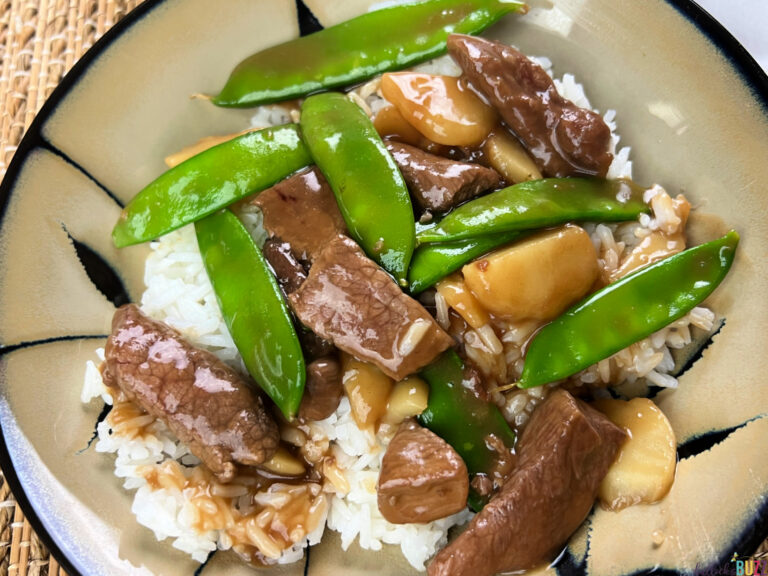 Beef with Snow Peas and Water Chestnuts Stir Fry in a bowl