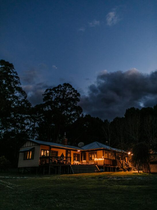 a house seen at night from the outside with lights on. Picking a good plan is a key part of finding the best energy plan for maximum savings