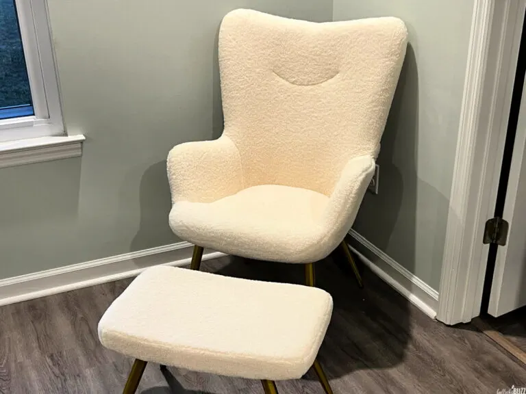 Yaheetech Accent Chair and Ottoman Set assembled and put in the corner of a room