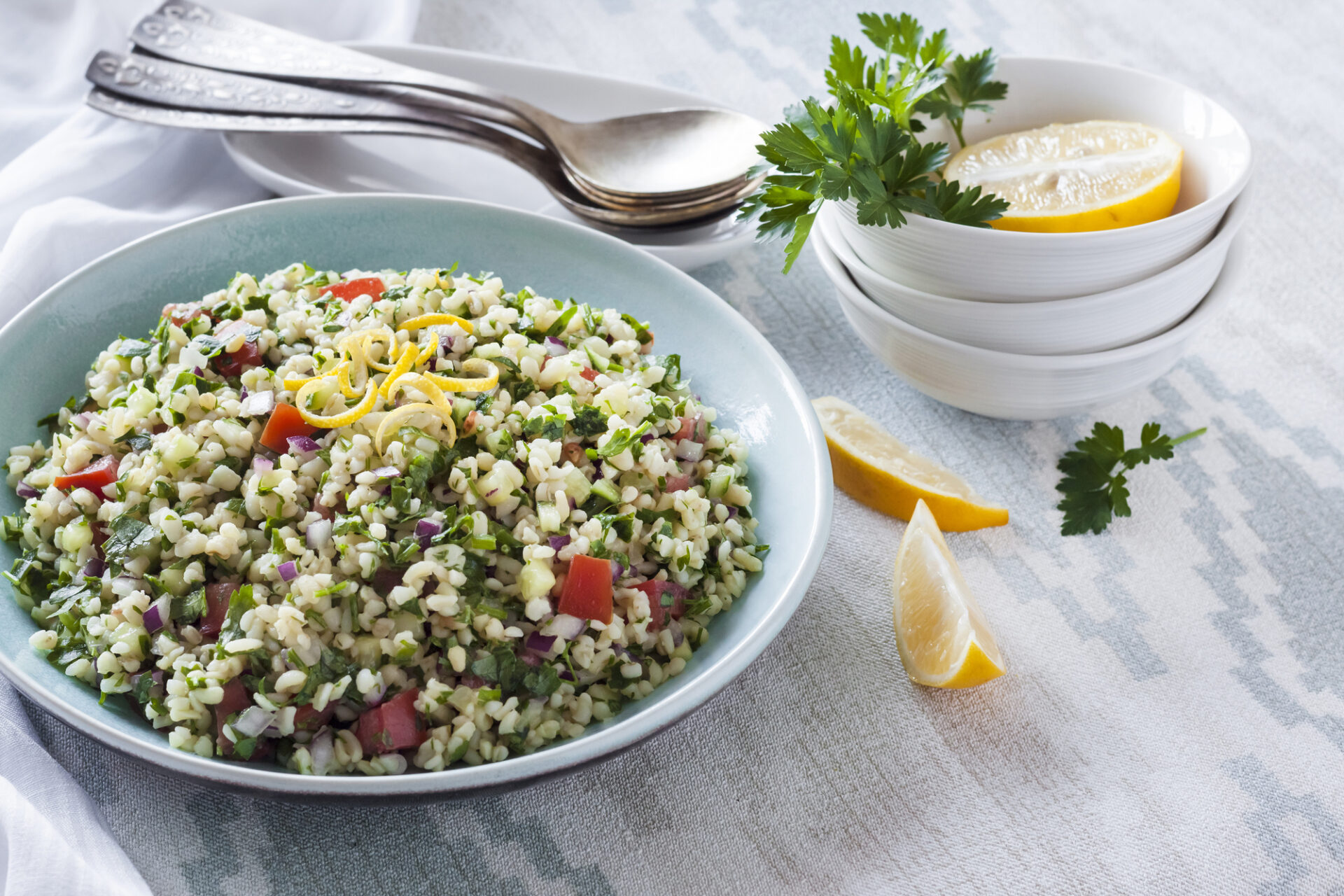 Tabbouleh salad. Traditional middle eastern or arab vegetarian salad with bulgur, parsley, mint and tomato.
