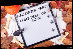 A letterboard with the words Halloween Party come dead or alive on it in black letters