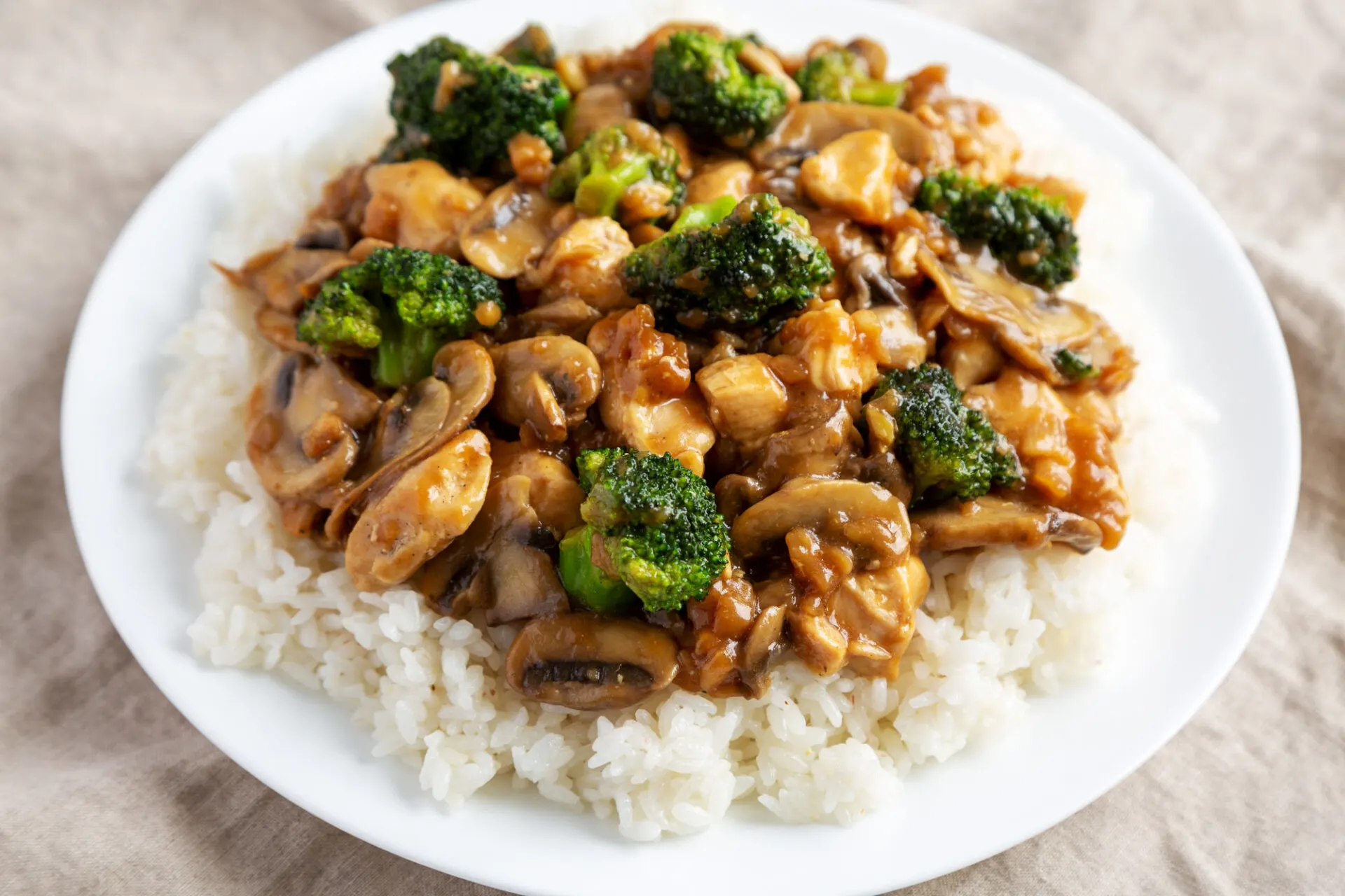 Homemade Chicken Veggie Stir Fry with White Rice, low angle view. Close-up.