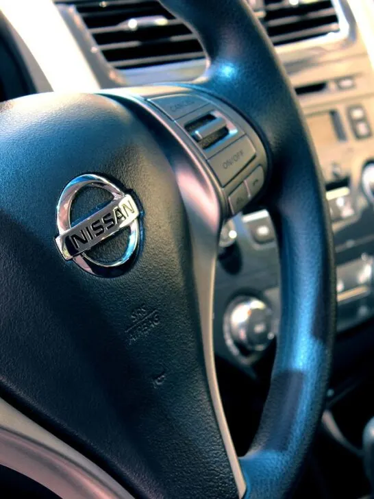 Interior features play a key role in selecting the right car like this steering wheel in a Nissan