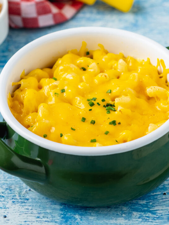 Delicious Mac n Cheese or macaroni and cheese on a green porcelain plate