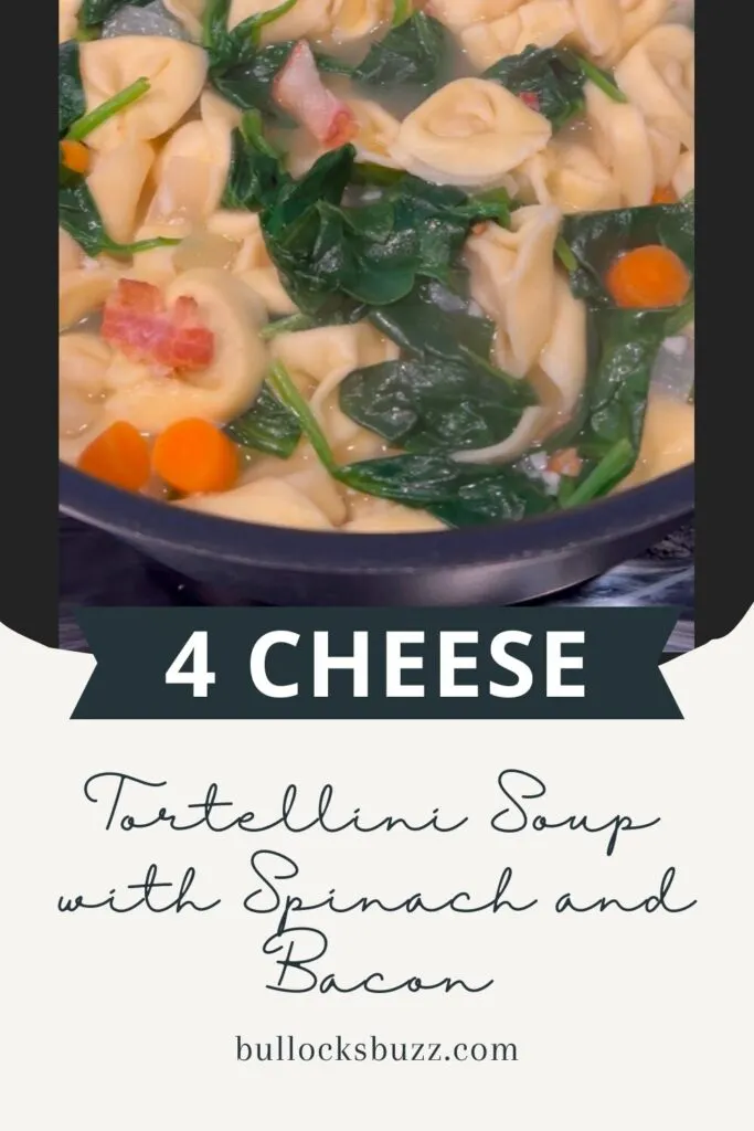 A close up image if finished Cheese Tortellini Soup with Spinach and Bacon in the pot