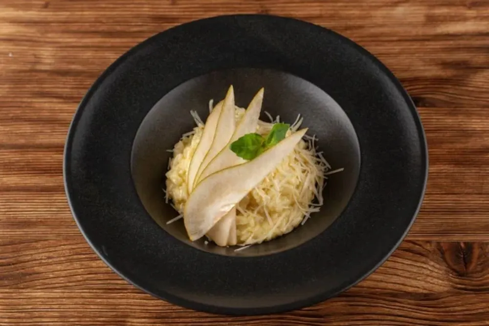 Creamy truffle risotto with grated parmesan