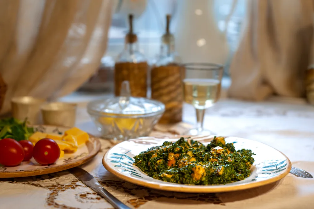 Homemade mashed salmon in pesto sauce