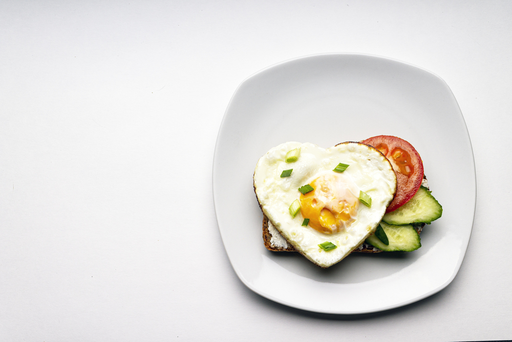 Avocado, egg, toast, cheese, tomato and lettuce
