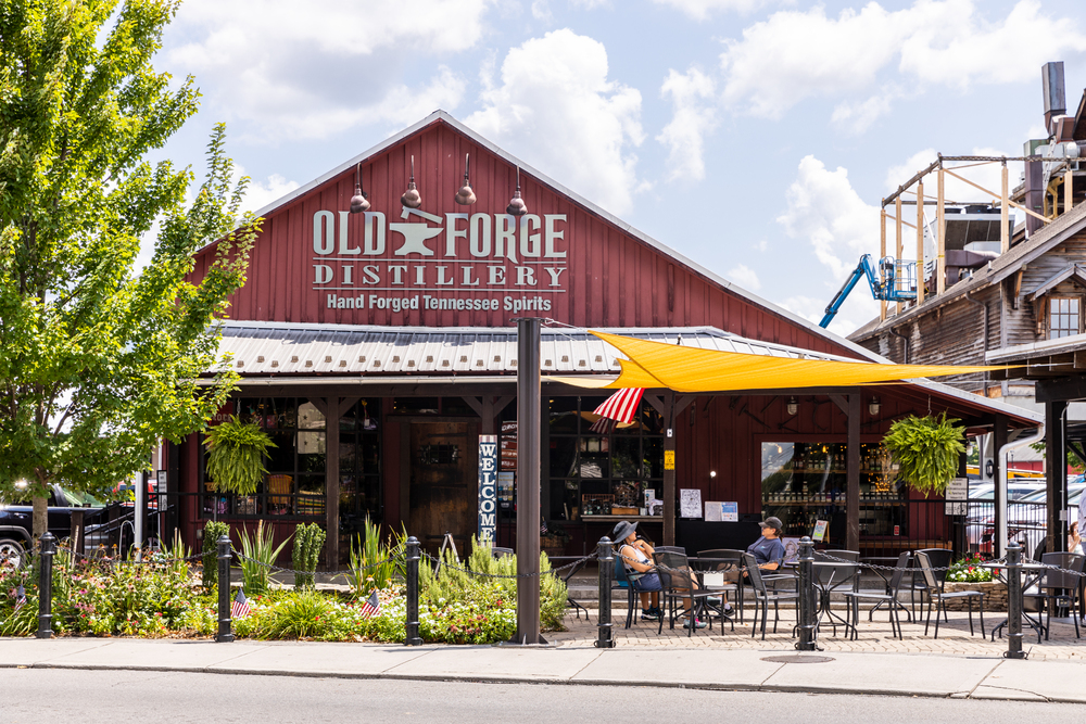 PIGEON FORGE, TN, USA - AUGUST 2, 2022: Old Forge Distillery is located in the Old Mill portion of Pigeon Forge, in the Smoky Mountains, and offer various types of craft spirits. — Photo by j.hendrickson3