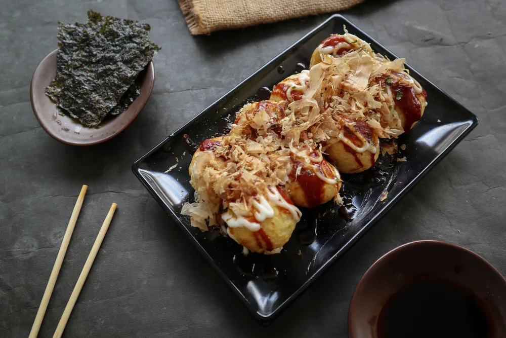 Takoyaki is a Japanese food, made from wheat flour dough