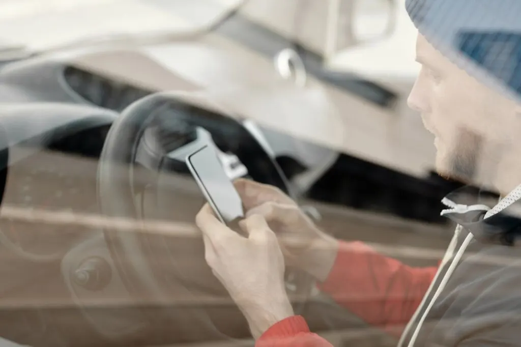 A guy texting while driving