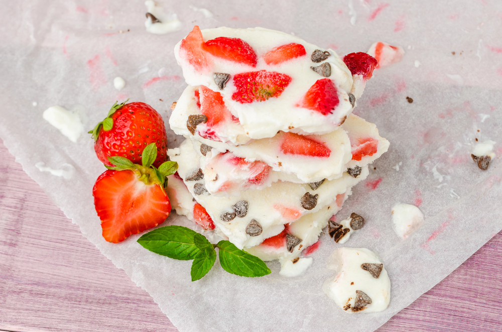Homemade healthy frozen strawberry yogurt bark. — Photo