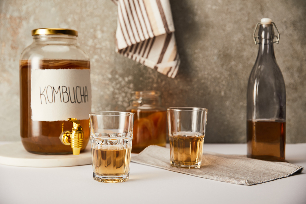 Jar Kombucha Glasses Bottle Textured Grey Background Striped Napkin — Stock Photo, Image