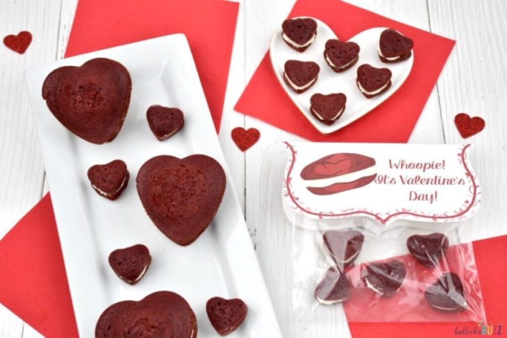 Red Velvet Whoopie Pies on white plate with printable gift tag next to them
