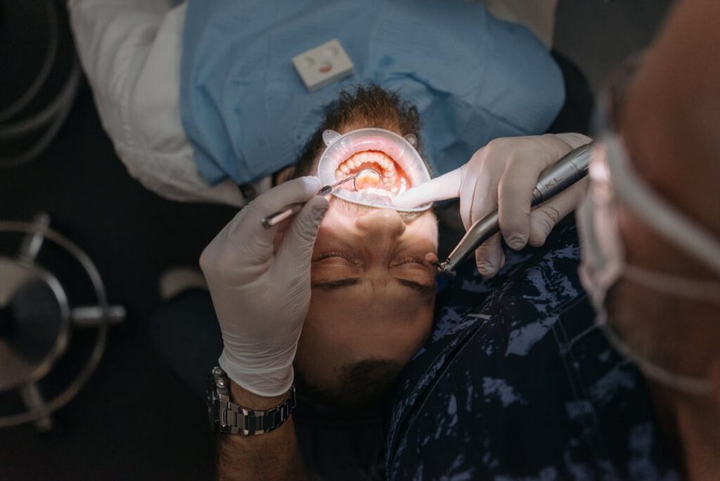 A man getting a filling after learning how tooth fillings can restore your teeth