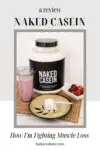 A jug of Naked Casein next to a cup of strawberry smoothie, a bowl of strawberries and a plate with a large scoop of Naked Casein protein powder