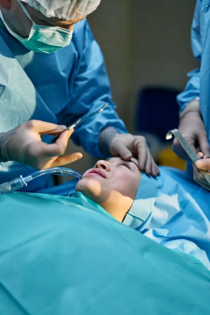 A surgeon about to perform plastic surgery on his patient