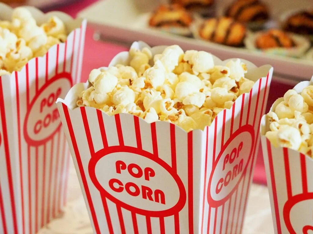 Containers of popcorn perfect for crafting the ultimate movie night for teen birthdays