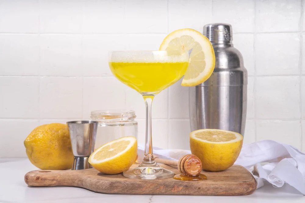 Sweet and sour boozy alcohol bee's knees cocktail.