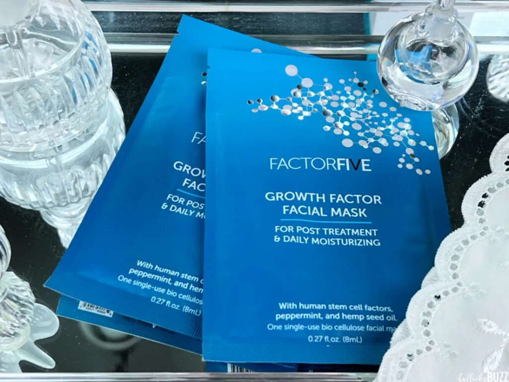 Close up of the FactorFive Skincare Products Growth Factor Facial Masks in blue packaging